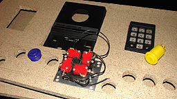 ColecoVision Roller Controller in the middle...